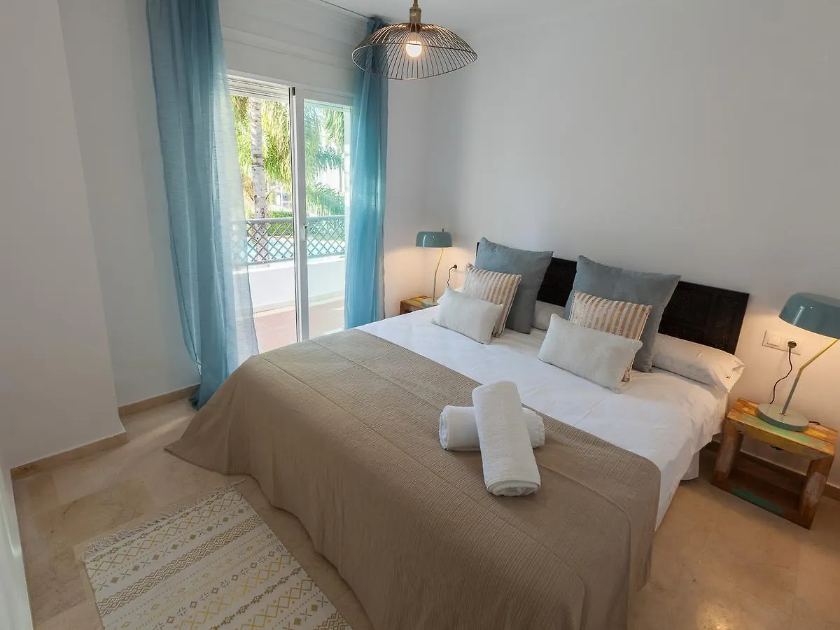 Vacation Marbella: Contemporary Central Apartment with Pool & Marina Proximity Marbella