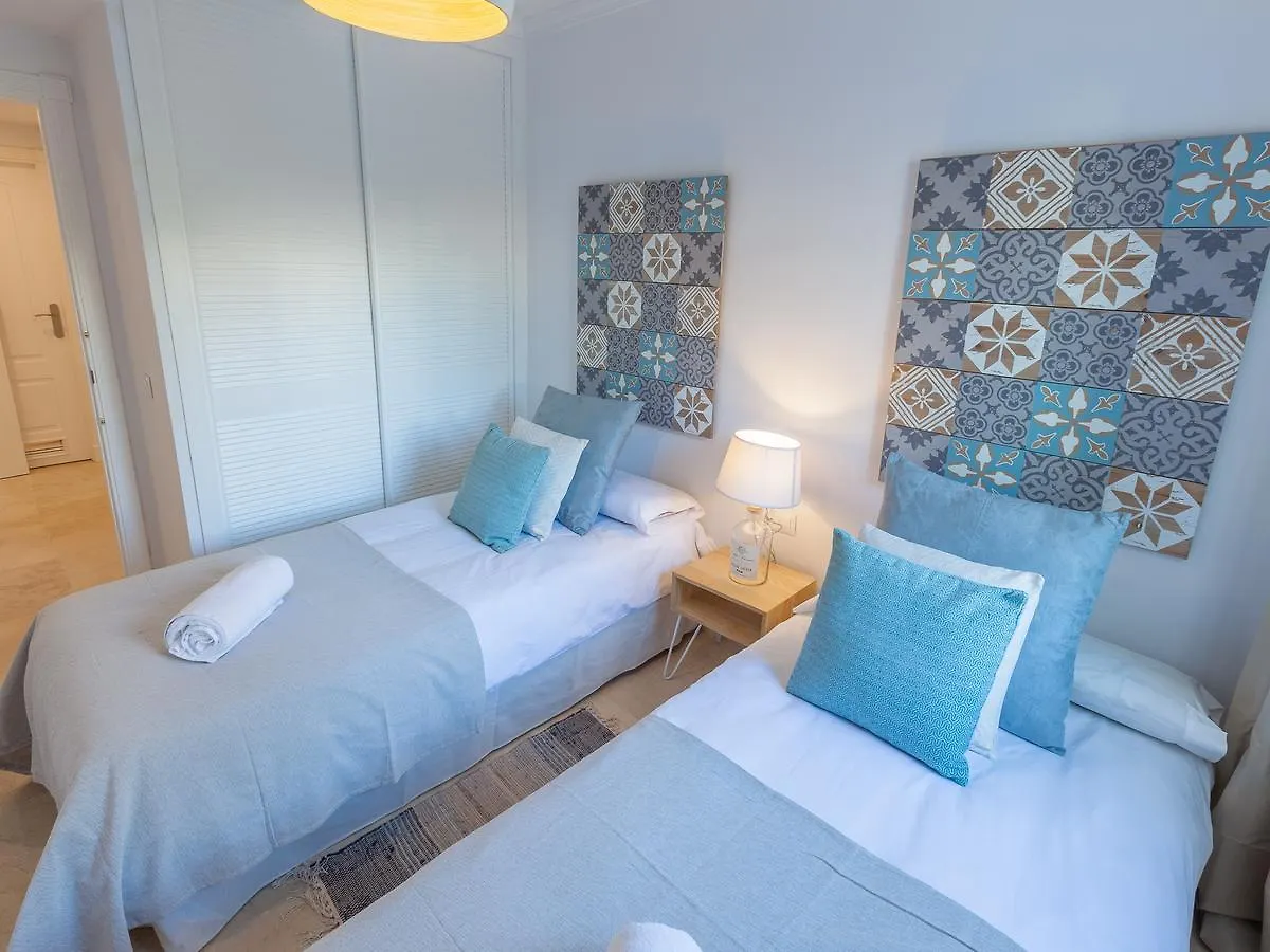 Vacation Marbella: Contemporary Central Apartment with Pool & Marina Proximity