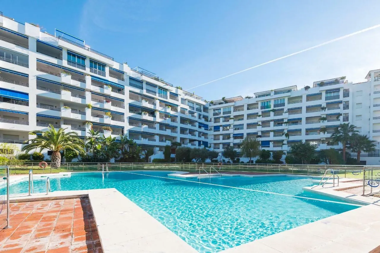 Vacation Marbella: Contemporary Central Apartment with Pool & Marina Proximity